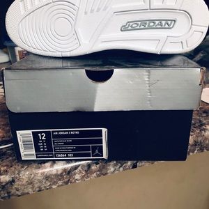 All white Jordan Retro 3